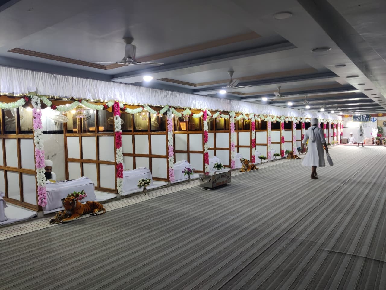 Sangat listening to Kirtan inside the Darbar Hall