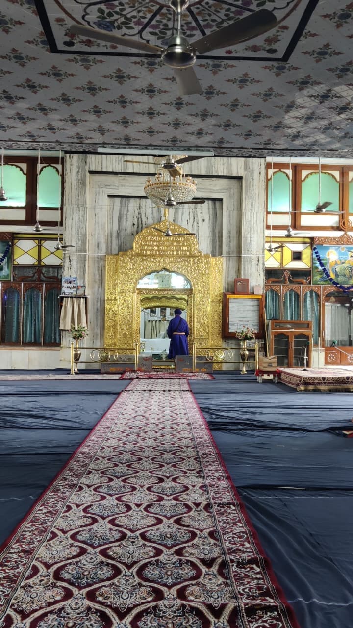 Wide view of the Gurdwara complex during a festival gathering